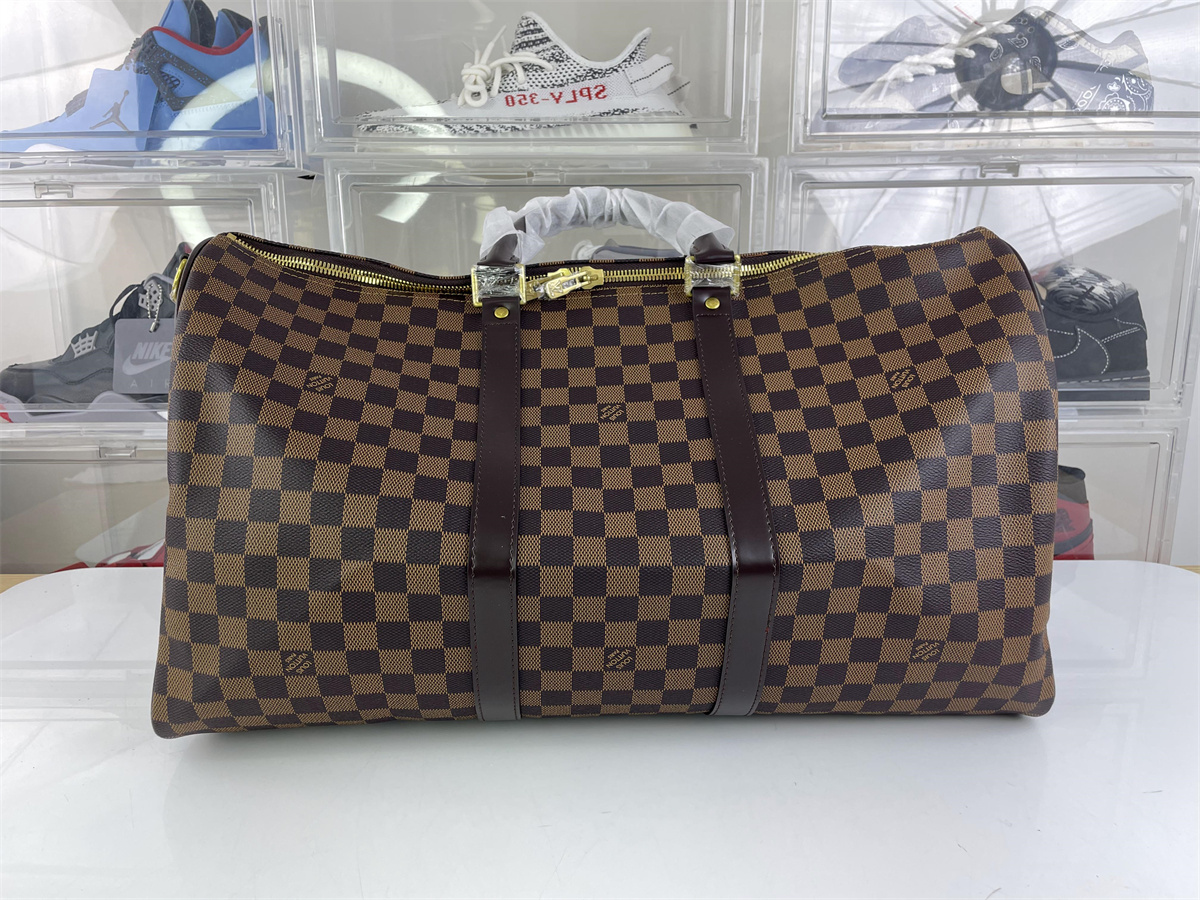 LV Brown Keeall bandouliere Travelling bag, 55 x 31 x24 cm