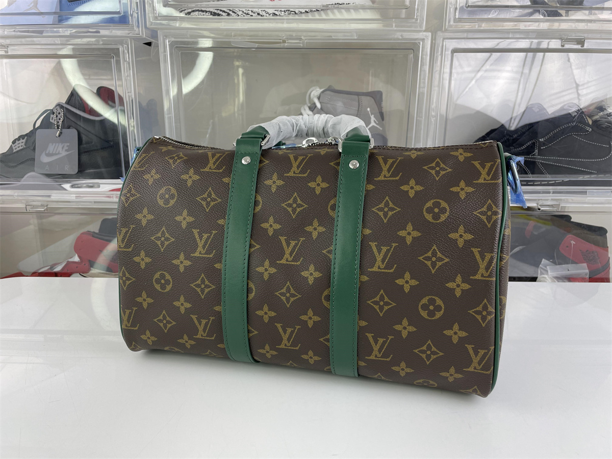 LV Brown with Dark Green strap Keeall Bandouliere travelling bag (34 x 21 x 16 cm)